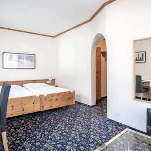 Room standard Double room Economy simple and plain. | © Davos Klosters Mountains